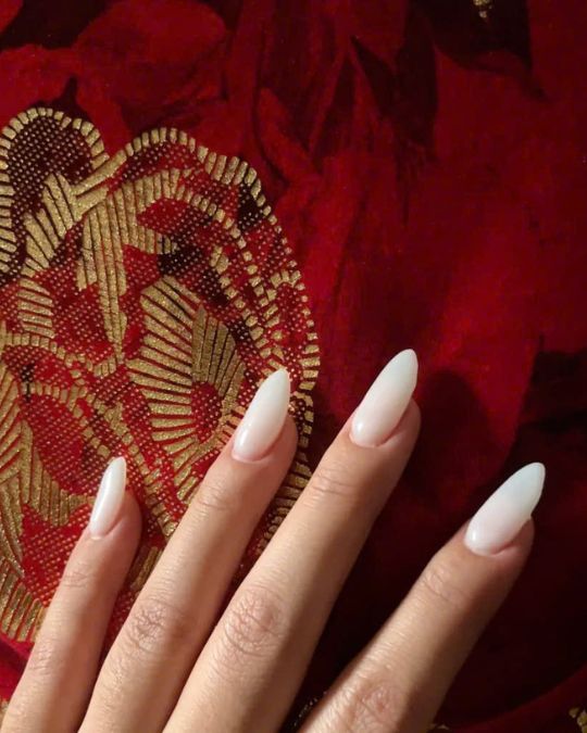 Milky white dip powder manicures
