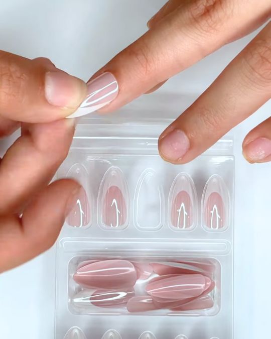 artificial nail enhancements or fake nails that can be easily applied at home without professional assistance