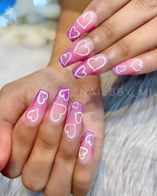 Long coffin nails with pink-to-purple ombré background Ombré Hearts Cascade