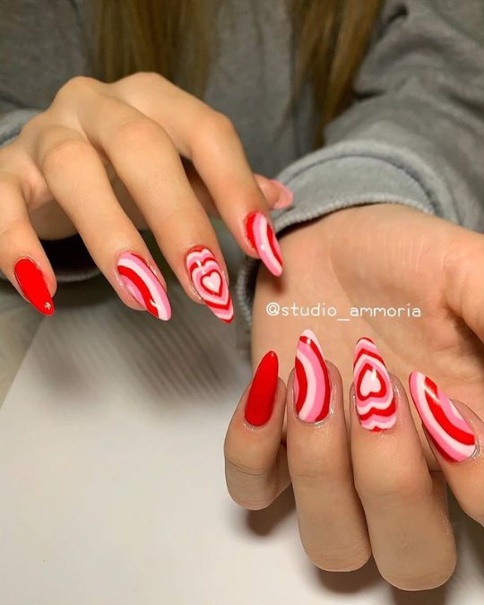 Stiletto nails Hypnotic Love Swirls for Valentine's day nails