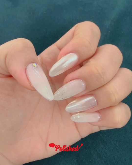 long stiletto nails with magnetic white effect