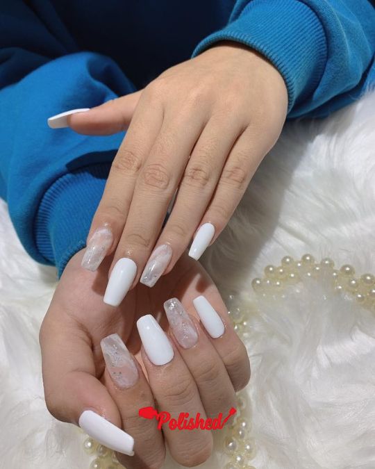 crisp white and delicate marble effect nails