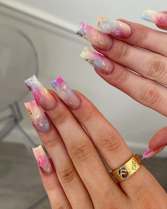 vibrant marble effect with gold flecks long square nails