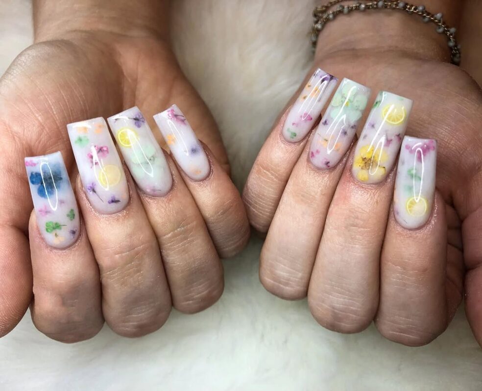 Dreamy milk bath nails with floating watercolor petals