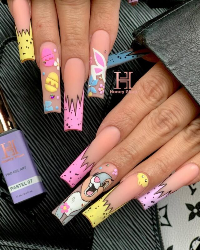 long square nails with cartoon patterns and matte finish