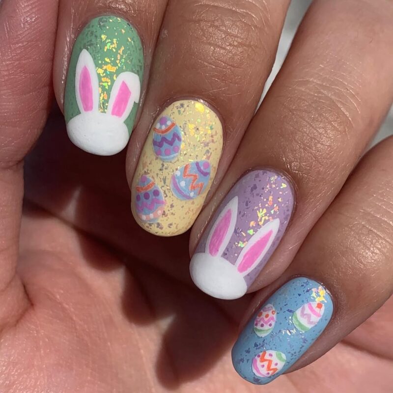 Easter colors playful bunny ears and mini eggs on short round nails