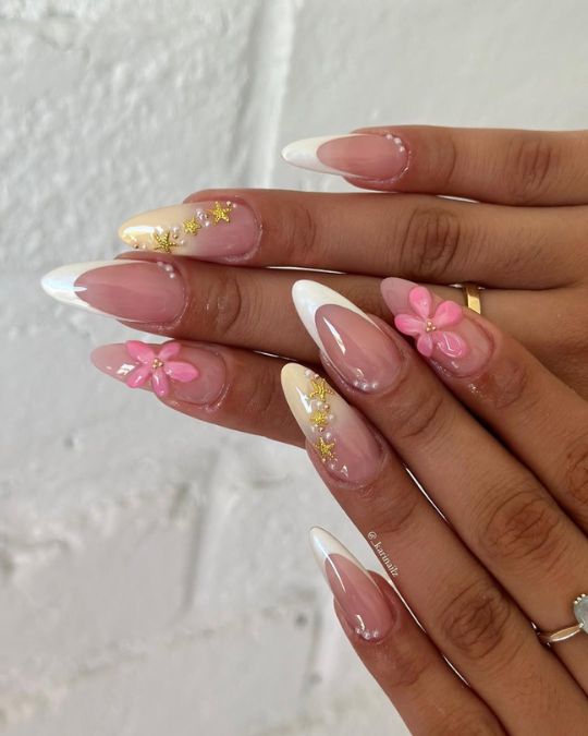 classic French tips with light pink flowers and golden glitter almond nails
