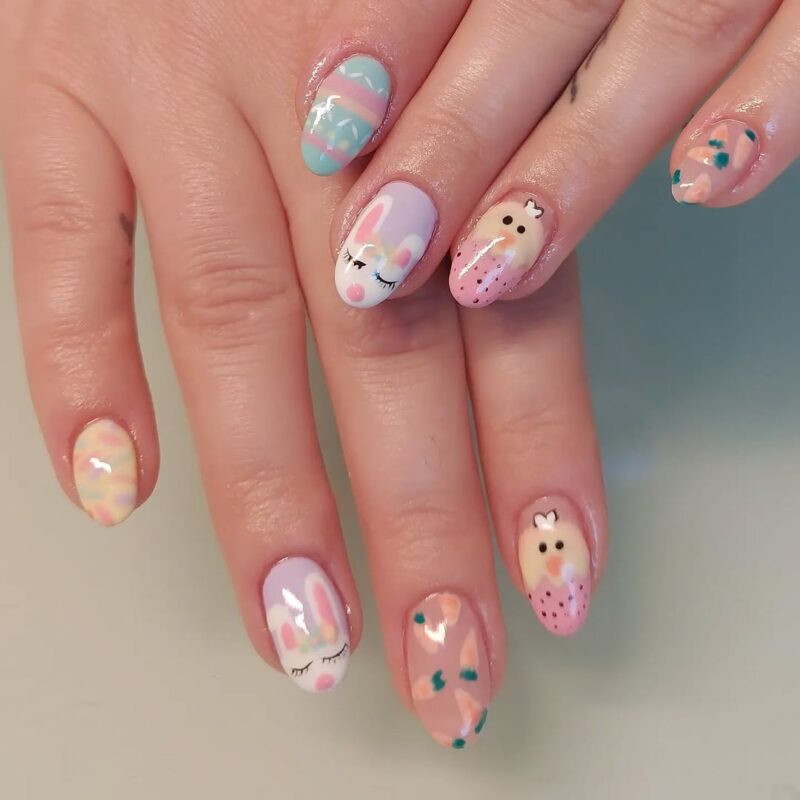 short round nails with pastel Easter patterns