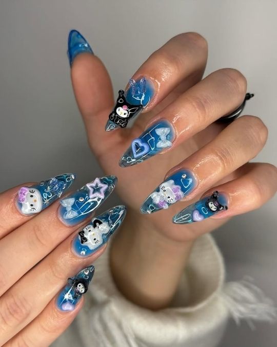 Kuromi and Hello Kitty figures on long blue nails