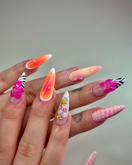 3D tropical flowers, and cute sea life charms inspired from ocean on long almond nails