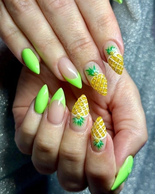 neon green french tip stiletto nails with 3D pineapple design
