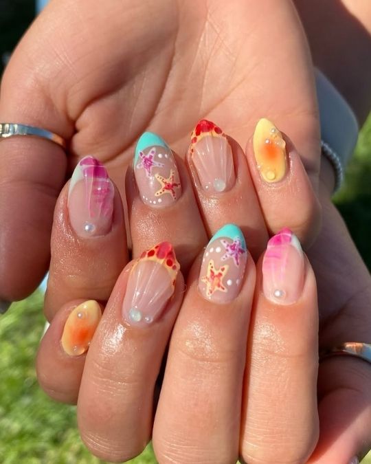 coral pinks, sunny yellows, and turquoise blues and beach -inspired patterns on short almond nails