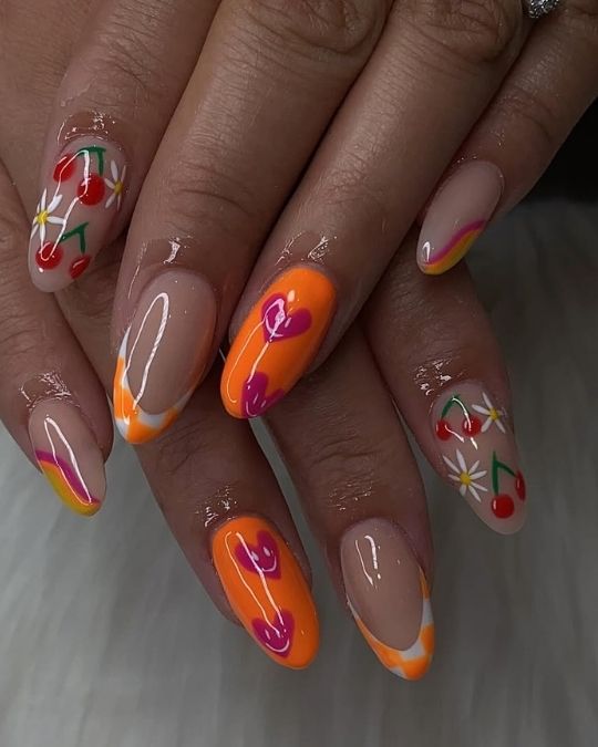 hot orange with cheerful cherries, daisies, and abstract designs french tips