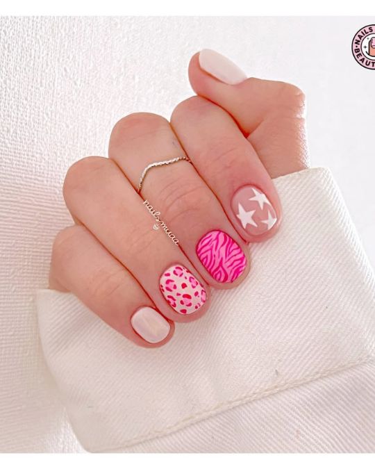 cute summer nails short round nails with with zebra stripes, leopard spots, and stars