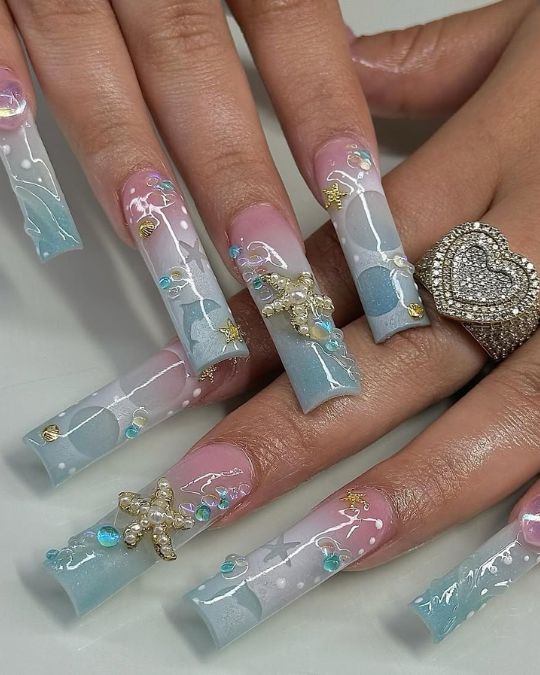 Long square nails with ocean-inspired icons for summer nail