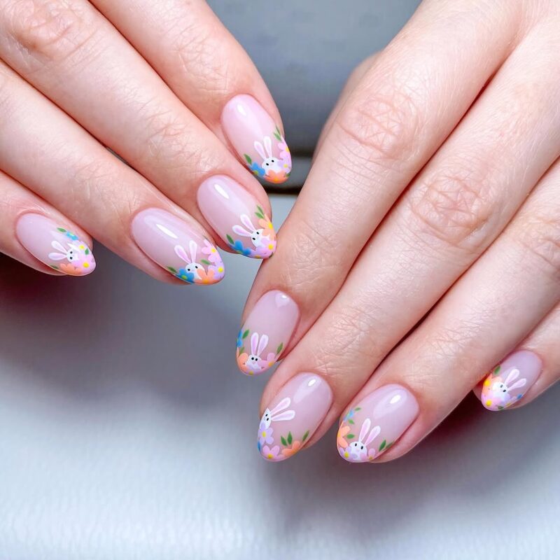 Easter-themed french tip short almond nails