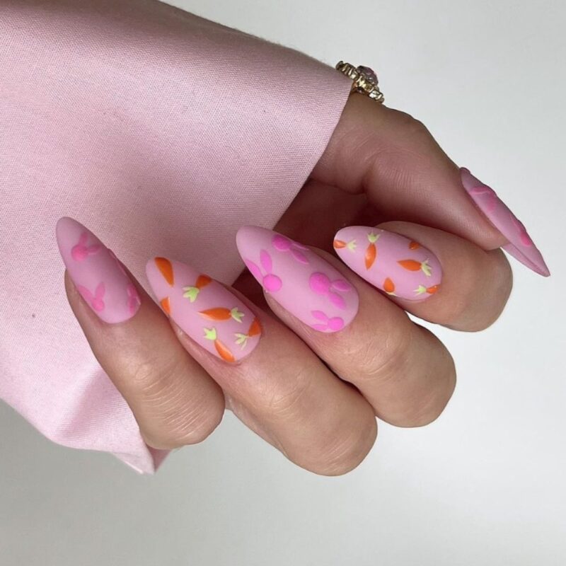 little playful bunny and carrot designs on almond nails