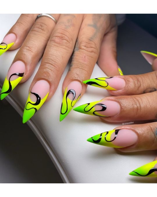 Cynnaildit Neon Stilettos Slay Everything — stunning neon nails idea