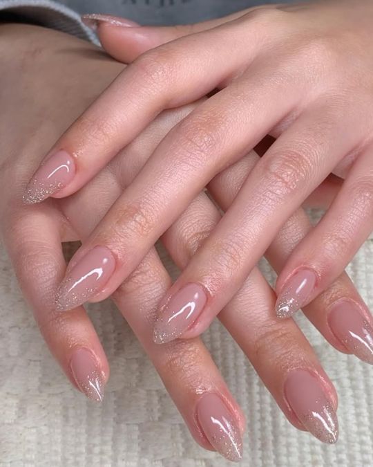 Shimmering Nude Almond Nails