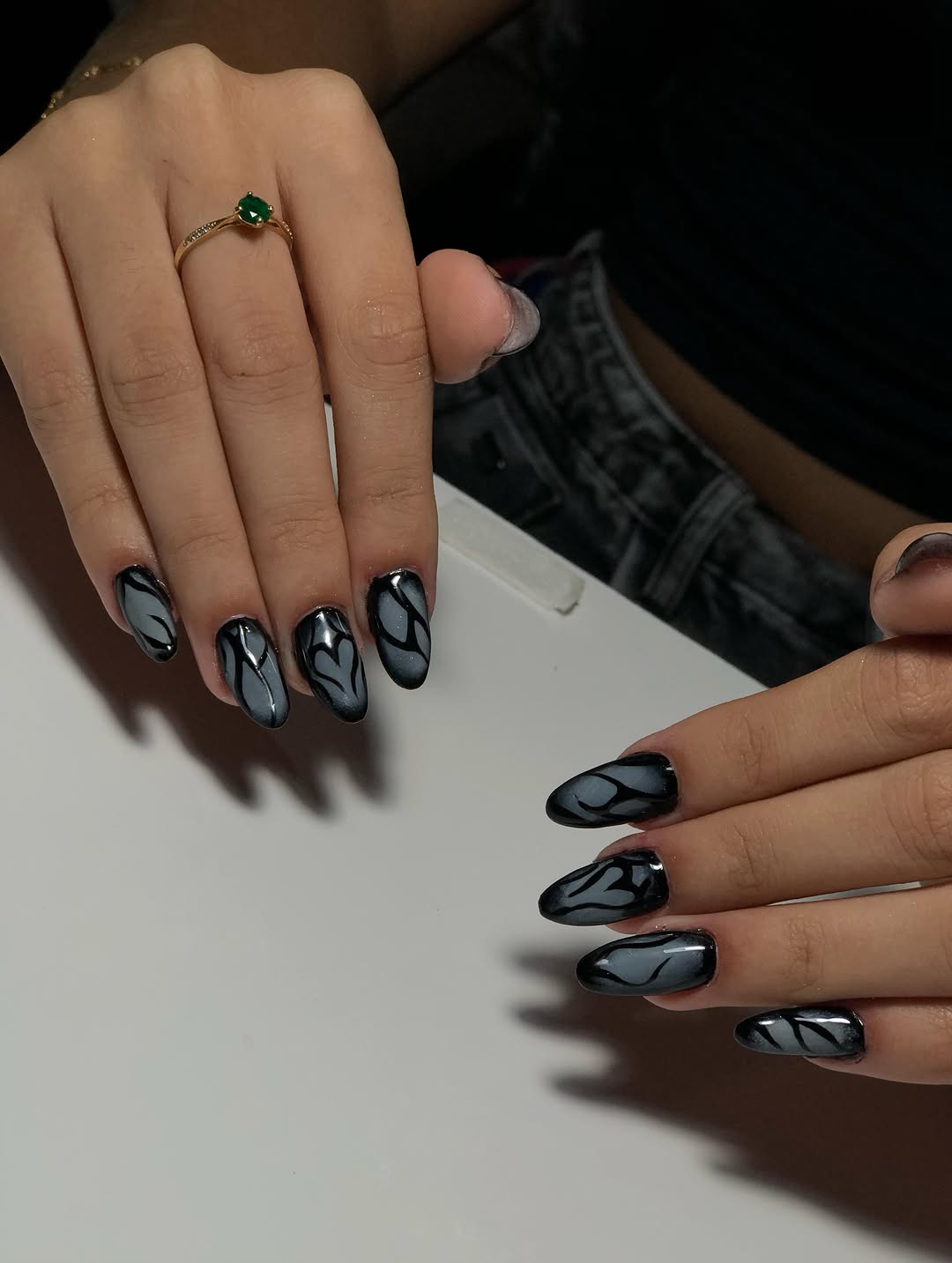Aura nail art with cyberpunk styling by Emy Lorrana, dark base with sharp aura